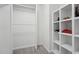 Walk-in closet features built-in shelving and ample hanging space for organized storage at 109 Chatterson Dr, Raleigh, NC 27615