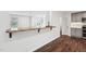 Stylish kitchen features a breakfast bar with hardwood countertop, perfect for casual dining at 109 Chatterson Dr, Raleigh, NC 27615