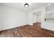 Bright living room featuring wood flooring and open access to other parts of the home at 109 Chatterson Dr, Raleigh, NC 27615