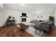 Cozy living room with stylish furnishings, fireplace, and a bright view from the window at 109 Chatterson Dr, Raleigh, NC 27615