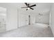 Large main bedroom with three closets, carpet, and a door to ensuite bathroom at 109 Chatterson Dr, Raleigh, NC 27615