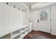 Convenient mudroom with built-in storage and a sink, providing an organized entry space at 109 Chatterson Dr, Raleigh, NC 27615