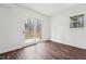 Bright, white room with sliding glass doors leading to an outdoor space at 109 Chatterson Dr, Raleigh, NC 27615