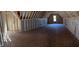 Unfinished attic with exposed wood beams and sheathing, showing construction progress at 1224 Red Cedar Ct # 33, Youngsville, NC 27596