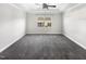Large bedroom has a ceiling fan and carpeted floors at 154 Magenta Rose Dr, Raleigh, NC 27610