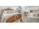 Light filled bedroom features a unique design with warm tones at 175 Stonecrest Way, Pittsboro, NC 27312
