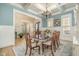 Formal dining room features coffered ceiling, wainscoting, and natural light at 175 Stonecrest Way, Pittsboro, NC 27312