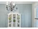 Dining room boasts a decorative china cabinet with decorative elements on display at 175 Stonecrest Way, Pittsboro, NC 27312