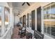 A cozy front porch with rocking chairs and a brick floor at 175 Stonecrest Way, Pittsboro, NC 27312