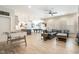 Open-concept living space with a foosball table, pool table, and comfortable seating area at 175 Stonecrest Way, Pittsboro, NC 27312