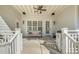 Well-lit outdoor patio with a fan and outdoor seating at 175 Stonecrest Way, Pittsboro, NC 27312