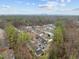An aerial view of the neighborhood, featuring tree-lined streets and well-maintained homes at 2268 Plum Frost Dr, Raleigh, NC 27603