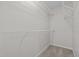 Walk-in closet has built-in shelving offering ample storage space at 2268 Plum Frost Dr, Raleigh, NC 27603