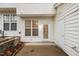 The rear of the house features a patio with a sliding glass door, storage shed, vinyl siding, and steps at 2268 Plum Frost Dr, Raleigh, NC 27603