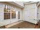 The rear of the house features a patio with a sliding glass door, storage shed, and vinyl siding at 2268 Plum Frost Dr, Raleigh, NC 27603
