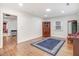 Bright living room with wood floors, fresh paint, and a cozy atmosphere at 2502 Devils Racetrack Rd, Four Oaks, NC 27524