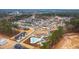 Bird's eye view of a neighborhood with a community pool at 2506 Gordal Trl, New Hill, NC 27562