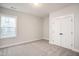 Neutral bedroom with closet and window with neighborhood views at 264 Big Bradley Dr, Wendell, NC 27591
