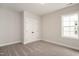 Bedroom featuring double-door closet and neutral colored carpet at 264 Big Bradley Dr, Wendell, NC 27591