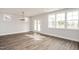 Bright living room with natural light, wood floors, and glass doors at 264 Big Bradley Dr, Wendell, NC 27591