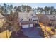 Inviting home with three-car garage situated on a beautifully landscaped lot in wooded neighborhood at 309 Malvern Hill Ln, Morrisville, NC 27560