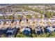 An elevated perspective of a peaceful neighborhood showcasing houses with tree-lined streets at 309 Malvern Hill Ln, Morrisville, NC 27560