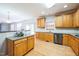 Kitchen with stainless steel appliances, granite countertops, tile backsplash, and center island at 309 Malvern Hill Ln, Morrisville, NC 27560