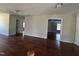 Bright, open living area boasts hardwood floors and a neutral color palette, ready for your personal touch at 309 Malvern Hill Ln, Morrisville, NC 27560