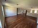 Expansive room features wood flooring, multiple recessed lights, and several access points at 309 Malvern Hill Ln, Morrisville, NC 27560