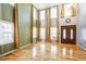 Grand living room with soaring ceilings, hardwood floors, and plenty of natural light at 309 Malvern Hill Ln, Morrisville, NC 27560