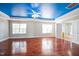 Large primary bedroom with a blue accent ceiling, and a ceiling fan at 309 Malvern Hill Ln, Morrisville, NC 27560