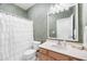 Bathroom featuring a textured wall, a shower curtain, and a single vanity at 3337 Scarlet Oak Dr, Mebane, NC 27302