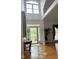 Elegant foyer with high ceilings, decorative columns, and bright natural light at 3337 Scarlet Oak Dr, Mebane, NC 27302