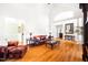 Spacious living room with hardwood floors, vaulted ceilings, and elegant furnishings at 3337 Scarlet Oak Dr, Mebane, NC 27302