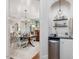 Dining room with adjacent butler's pantry featuring mini refrigerator and storage at 3343 Ridgecrest Ct, Raleigh, NC 27607