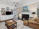 Inviting living room with built-in shelving, a fireplace, and comfortable seating at 3343 Ridgecrest Ct, Raleigh, NC 27607