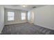 Spacious bedroom featuring plush carpeting and ample natural light at 3505 Triad Ct, Raleigh, NC 27604