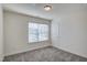 Cozy bedroom featuring plush carpeting, a window, and a neutral color palette at 3505 Triad Ct, Raleigh, NC 27604