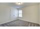 Bedroom featuring a large window and double-door closet, offering ample space at 3505 Triad Ct, Raleigh, NC 27604