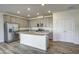 Kitchen with granite countertops, stainless steel appliances, and gray cabinetry at 3505 Triad Ct, Raleigh, NC 27604