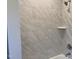 Bright bathroom featuring a tub with marble tile surround and updated fixtures at 3909 Cedar Knolls Dr # 6, Youngsville, NC 27596