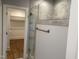Modern bathroom with glass enclosed shower and view to the closet at 3909 Cedar Knolls Dr # 6, Youngsville, NC 27596