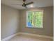 Bright bedroom featuring natural light from a large window at 3909 Cedar Knolls Dr # 6, Youngsville, NC 27596