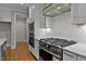 Close up of kitchen featuring stainless appliances, white subway tile, and custom cabinetry at 3909 Cedar Knolls Dr # 6, Youngsville, NC 27596