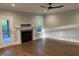 Bright living room features a fireplace and hardwood floors at 3909 Cedar Knolls Dr # 6, Youngsville, NC 27596