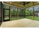 Covered outdoor patio with ample space for seating and entertaining, offering a serene backyard view at 3909 Cedar Knolls Dr # 6, Youngsville, NC 27596