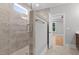 The luxury walk-in shower features a rain shower head, with marble surround and glass partition at 3909 Cedar Knolls Dr # 6, Youngsville, NC 27596