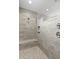 The walk-in shower features marble surround, rain shower head, and shower seat at 3909 Cedar Knolls Dr # 6, Youngsville, NC 27596