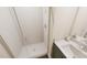 This bathroom features a glass enclosed shower with white subway tile and a single sink vanity at 3928 Willow Gate Way, Raleigh, NC 27604