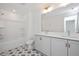 Stylish bathroom featuring double sinks, and a shower-tub combination at 3928 Willow Gate Way, Raleigh, NC 27604